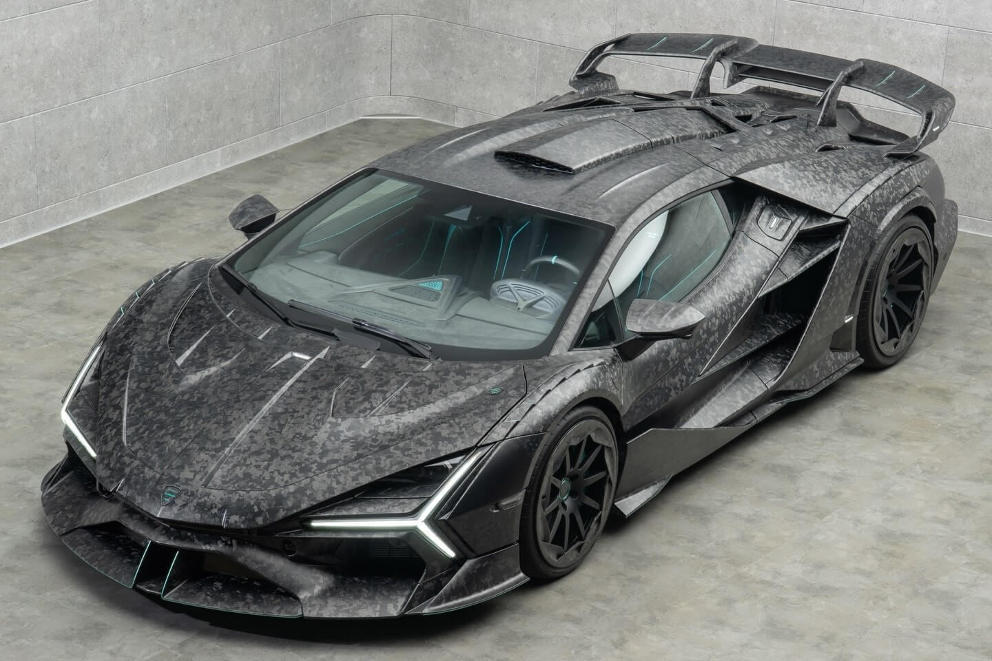 a 1120 horsepower lamborghini revuelto fully clad in carbon fiber is called carbonado x 5.jpg