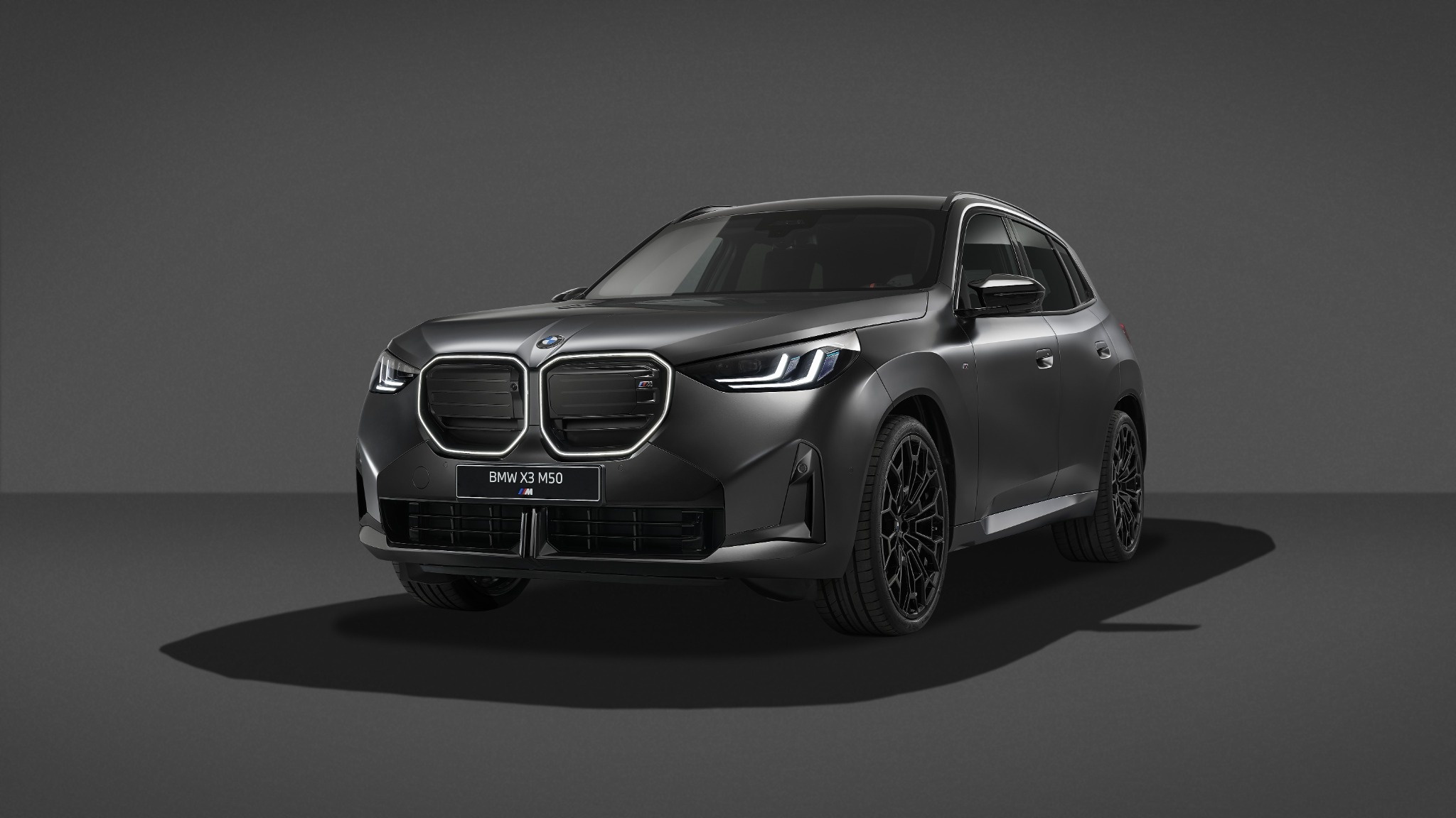03 bmw x3 m50 front three quarter alt.jpg