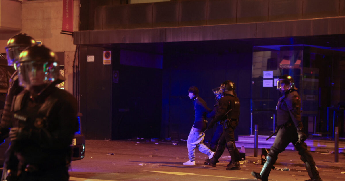 spain riots reuters 1200x630.jpg